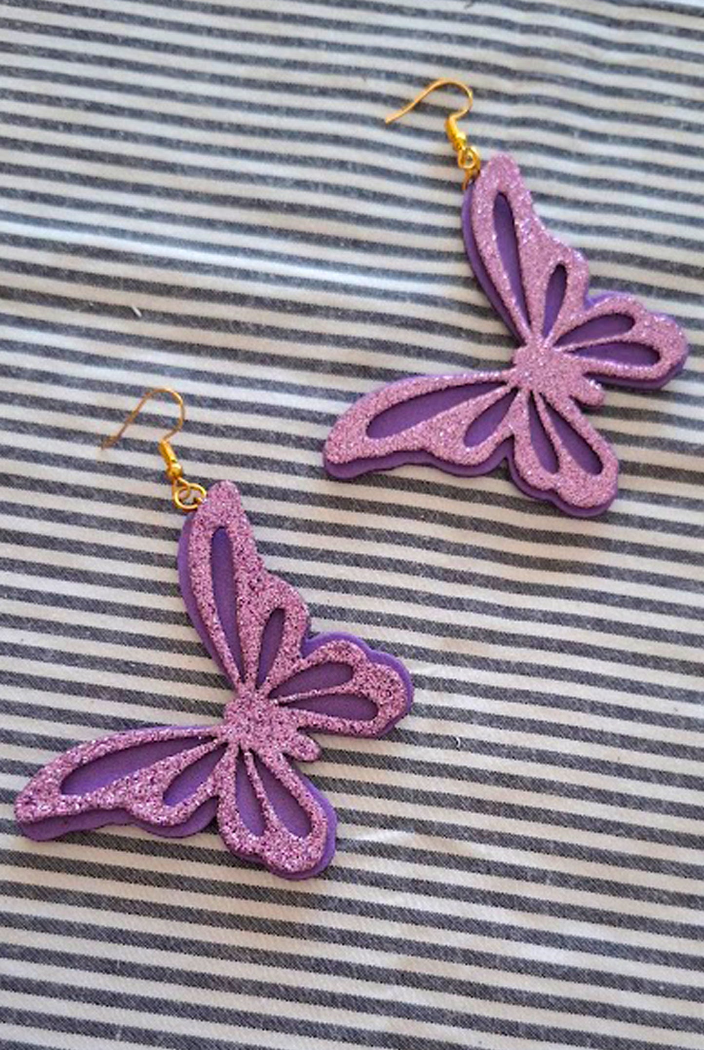 BRINCO BORBOLETA ROXA