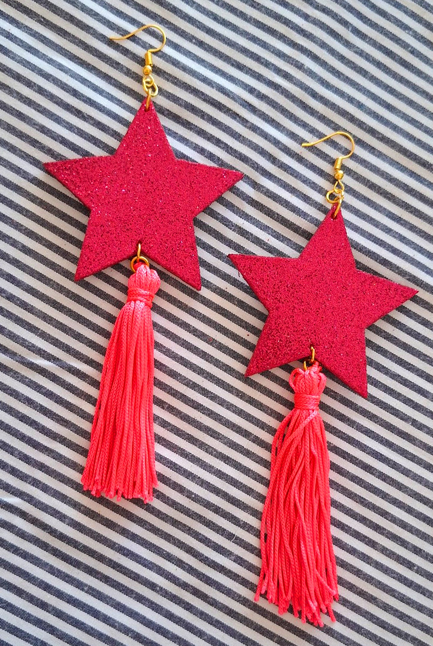 BRINCO ESTRELA TASSEL ROSA